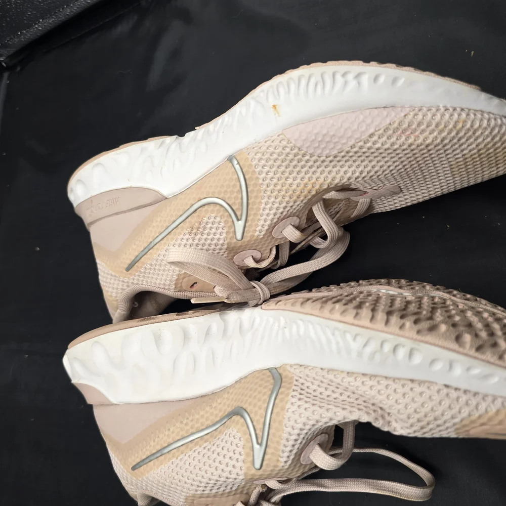Nike Cream and White Athletic Shoes with Streamlined Design‎